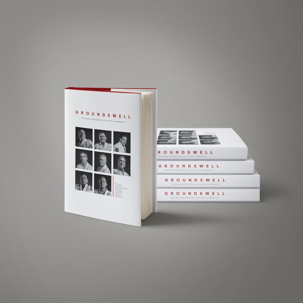 Groundswell Collector's Edition white hardcover standing beside a stack of copies